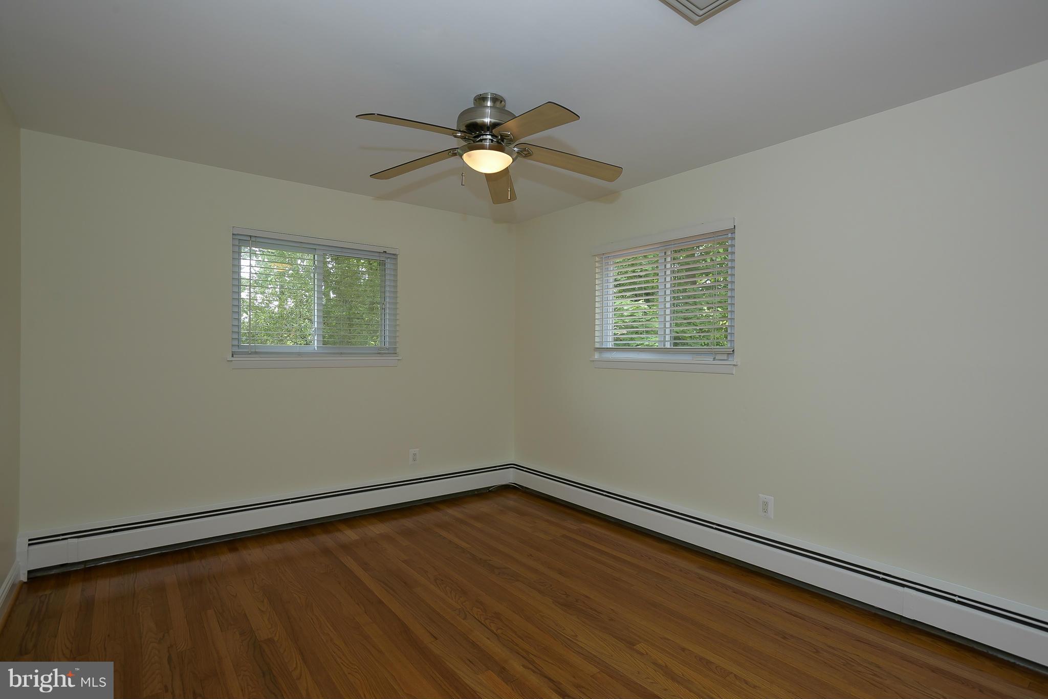 100 Shortcross Road Linthicum Heights, MD 21090 - Photo 14 of 30 a view of empty room with wooden floor