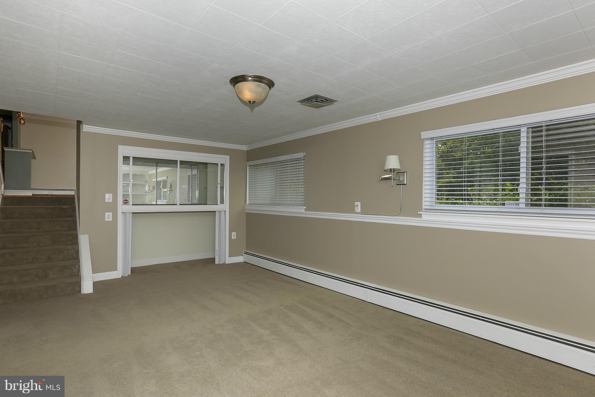100 Shortcross Road Linthicum Heights, MD 21090 - Photo 17 of 30 an empty room with windows