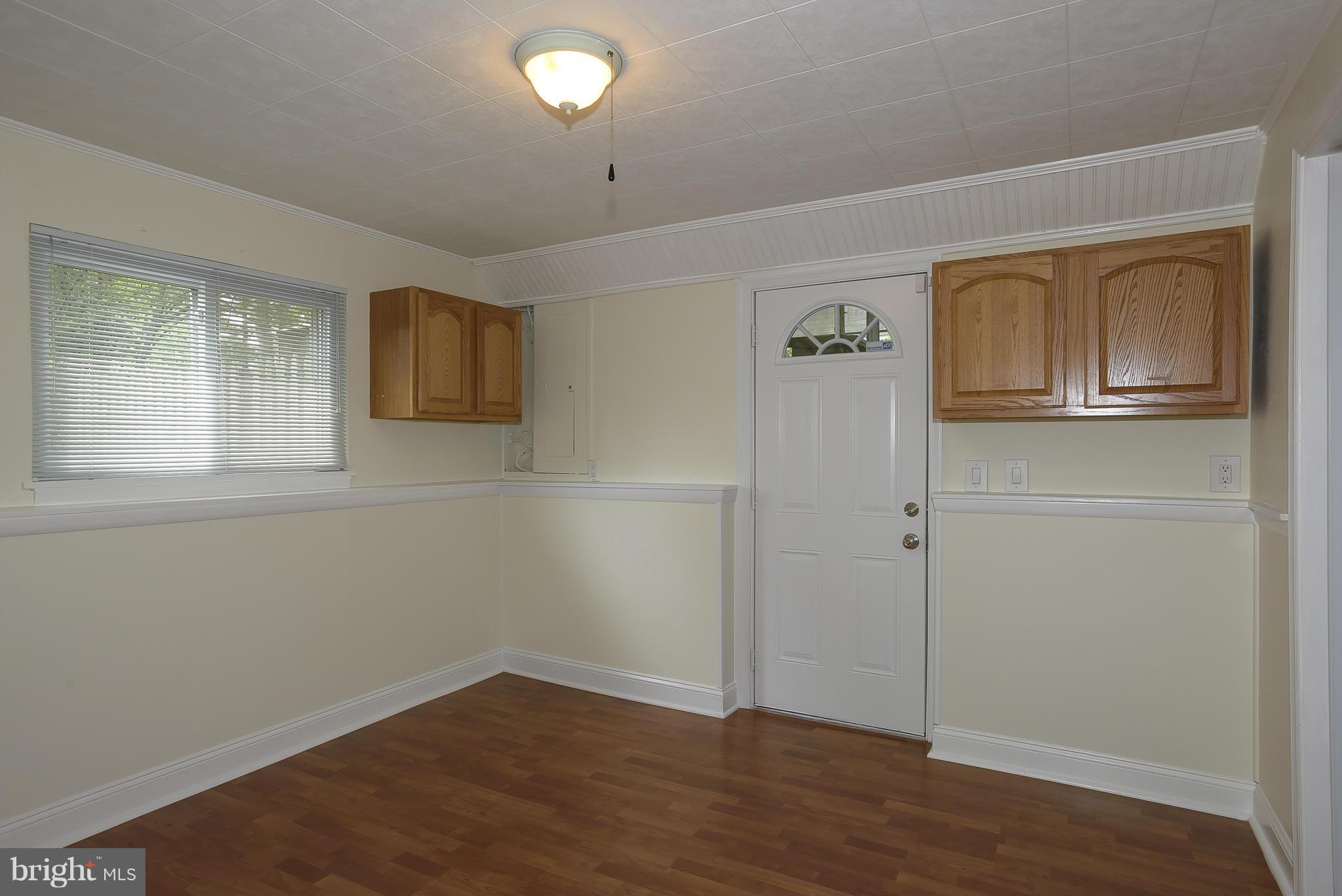 100 Shortcross Road Linthicum Heights, MD 21090 - Photo 19 of 30 a view of an empty room with closet and wooden floor