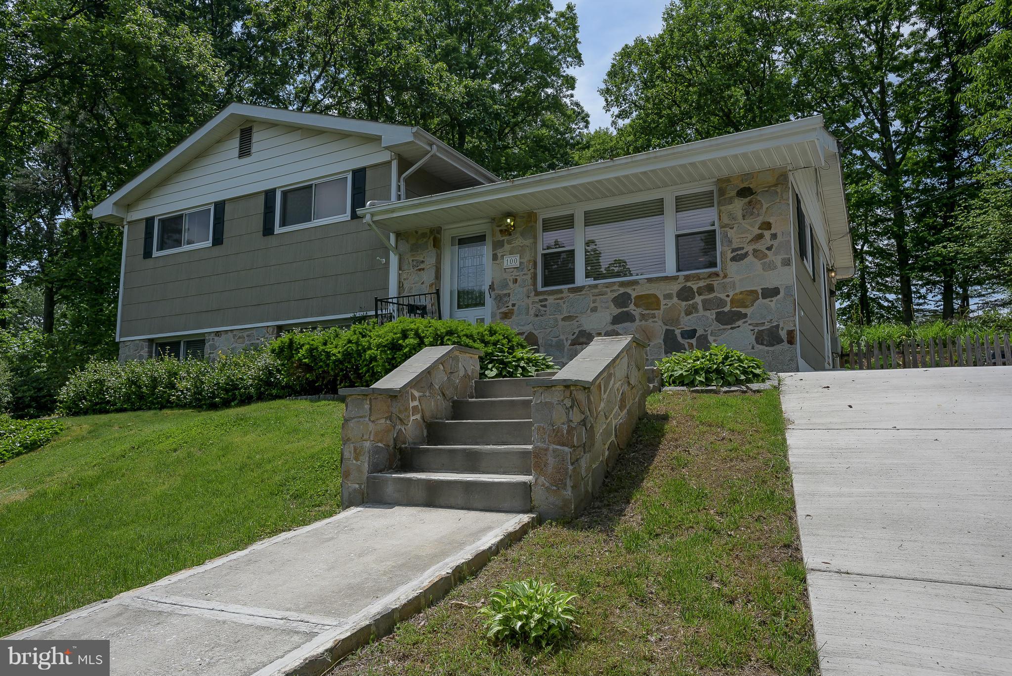 100 Shortcross Road Linthicum Heights, MD 21090 - Photo 2 of 30 a front view of a house with a yard