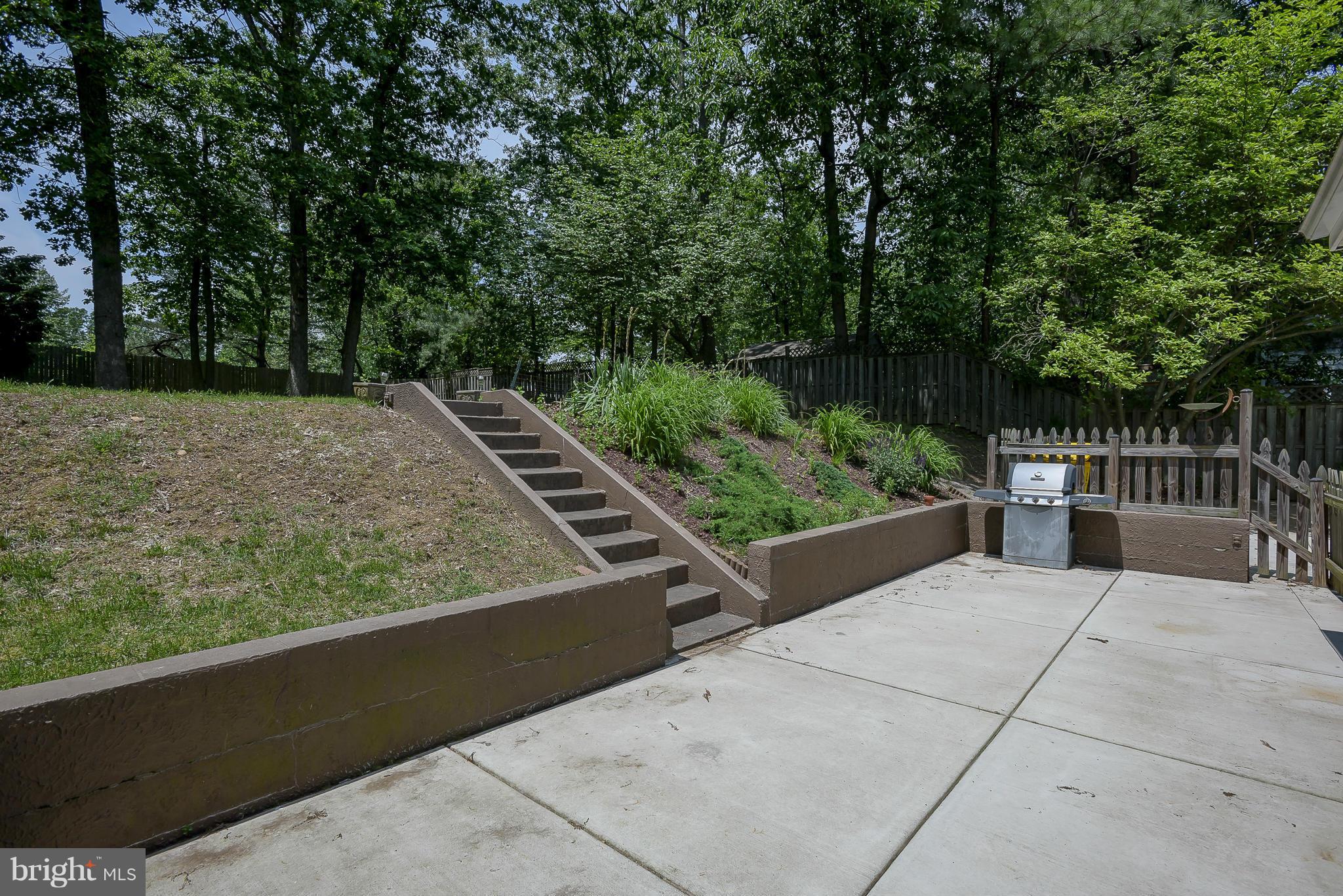 100 Shortcross Road Linthicum Heights, MD 21090 - Photo 24 of 30 a view of a backyard with sitting area