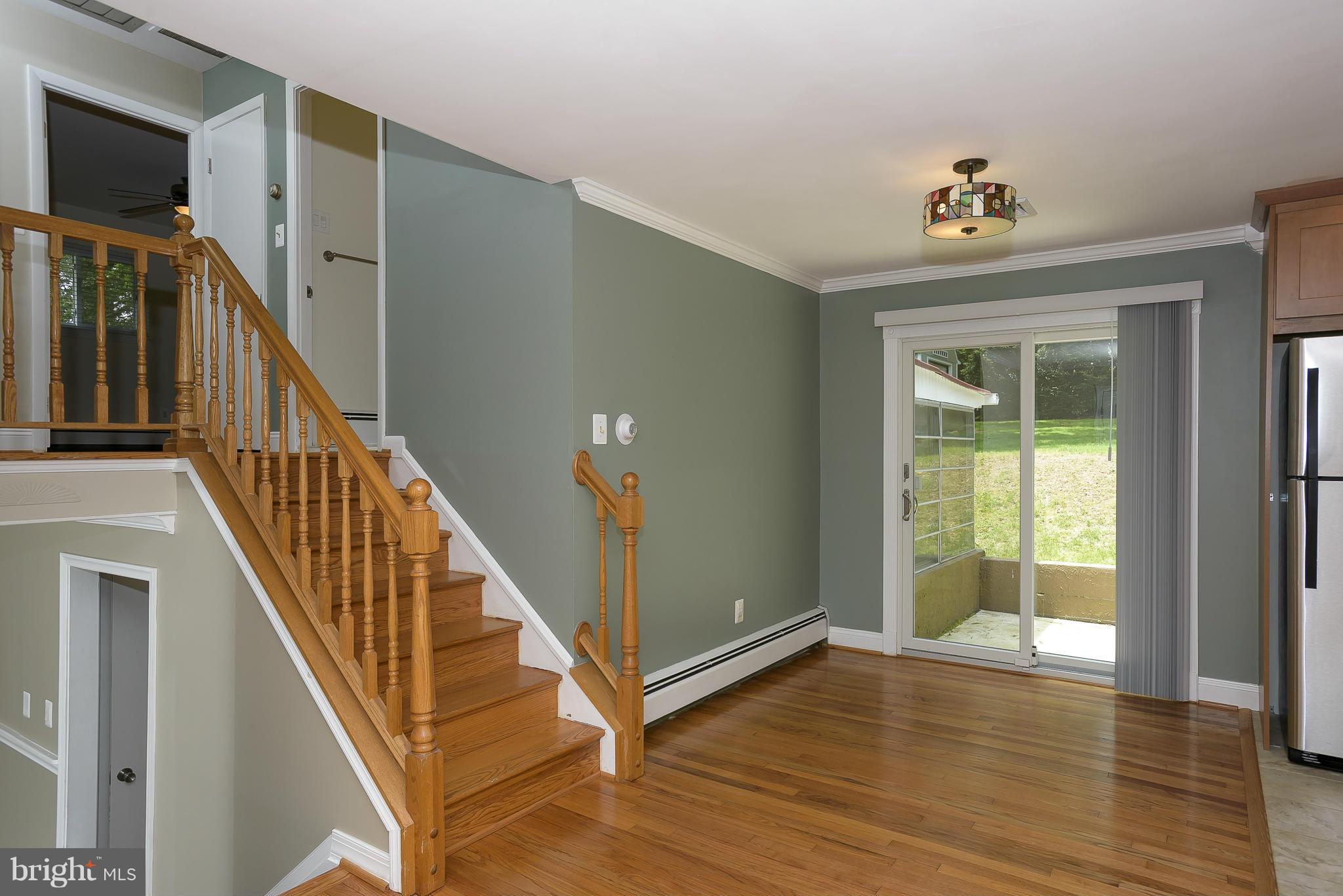 100 Shortcross Road Linthicum Heights, MD 21090 - Photo 6 of 30 a view of an entryway with wooden floor