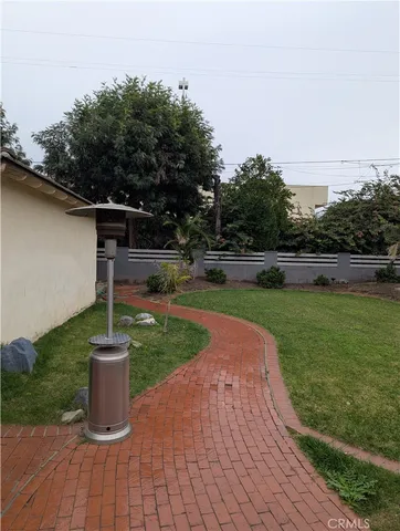 a view of a garden with a slide