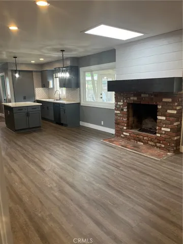 a view of a garden with a fountain