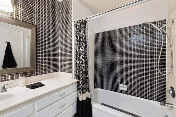 a bathroom with a sink and a bathtub