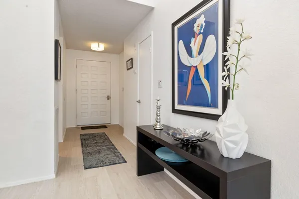 a bathroom with a mirror and a sink