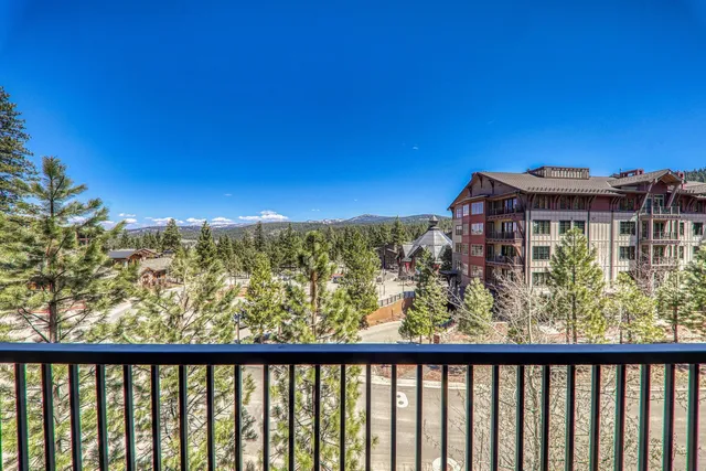 a view of a building from a balcony