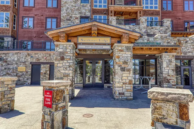a front view of a building with glass windows
