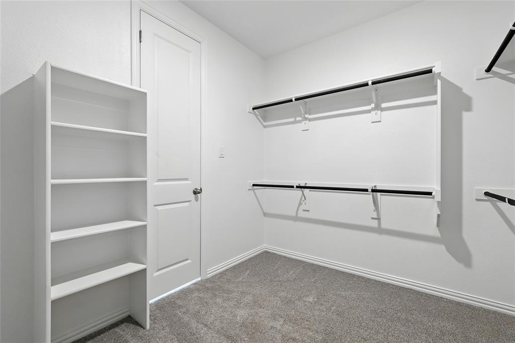 2515 Ridgecrest Lane Sherman, TX 75092 - Photo 21 of 40 Walk in closet with carpet