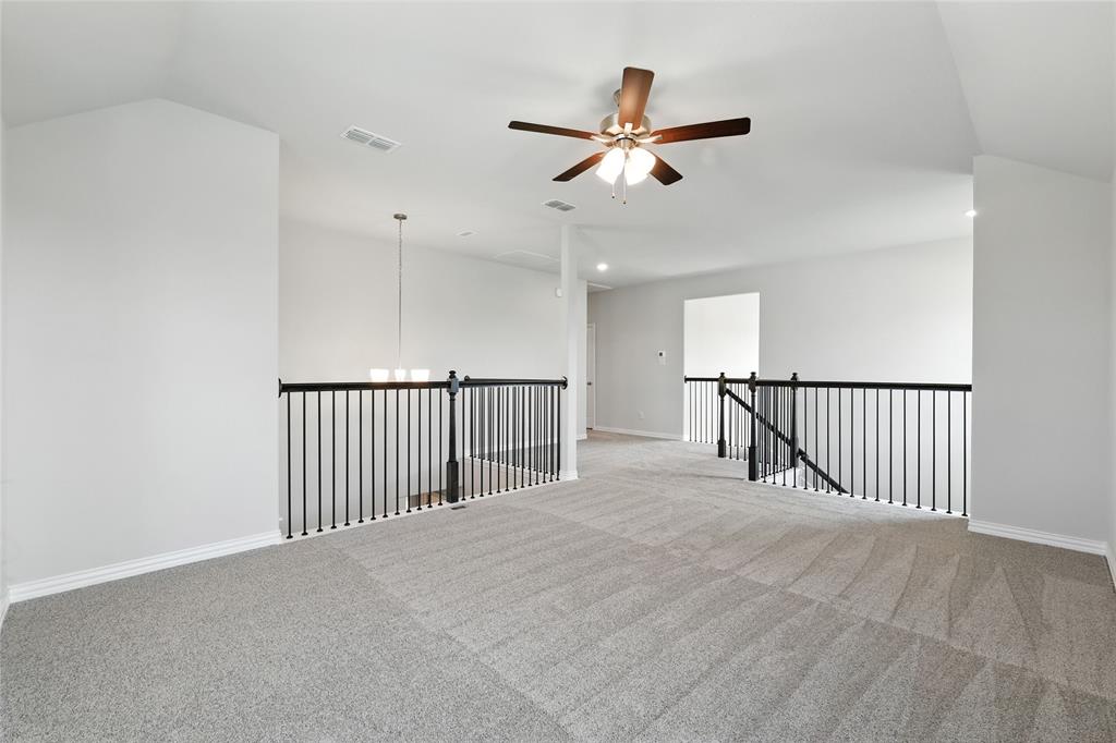 2515 Ridgecrest Lane Sherman, TX 75092 - Photo 24 of 40 Carpeted spare room featuring a ceiling fan and recessed lighting