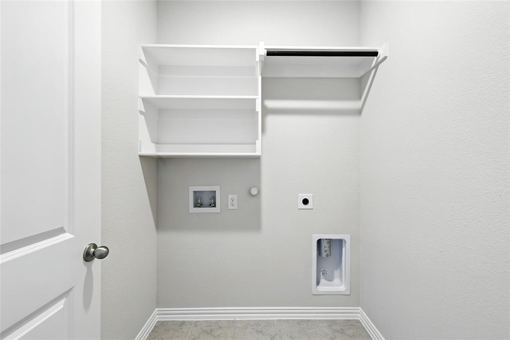 2515 Ridgecrest Lane Sherman, TX 75092 - Photo 27 of 40 Laundry room featuring hookup for a gas dryer, hookup for an electric dryer, and washer hookup