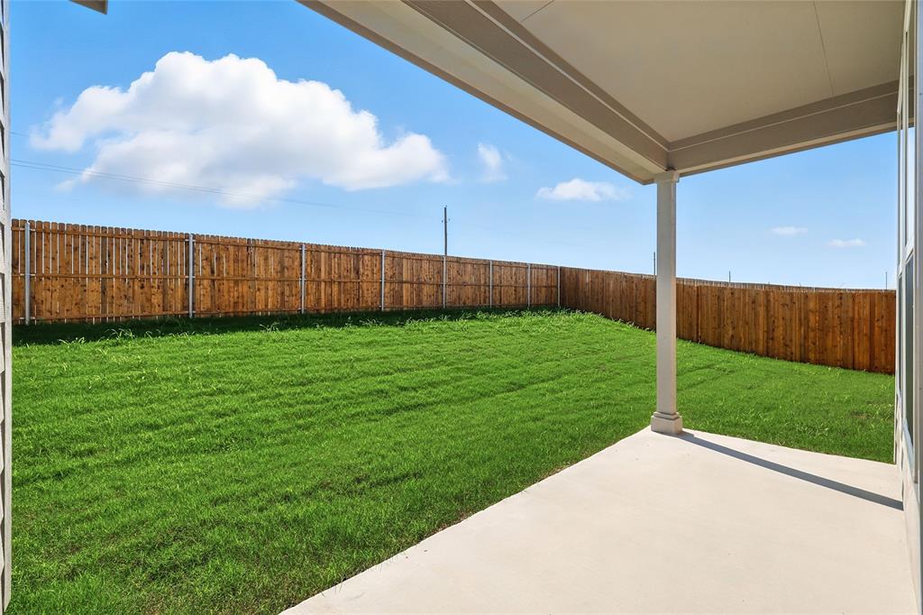 2515 Ridgecrest Lane Sherman, TX 75092 - Photo 28 of 40 Fenced backyard with a patio