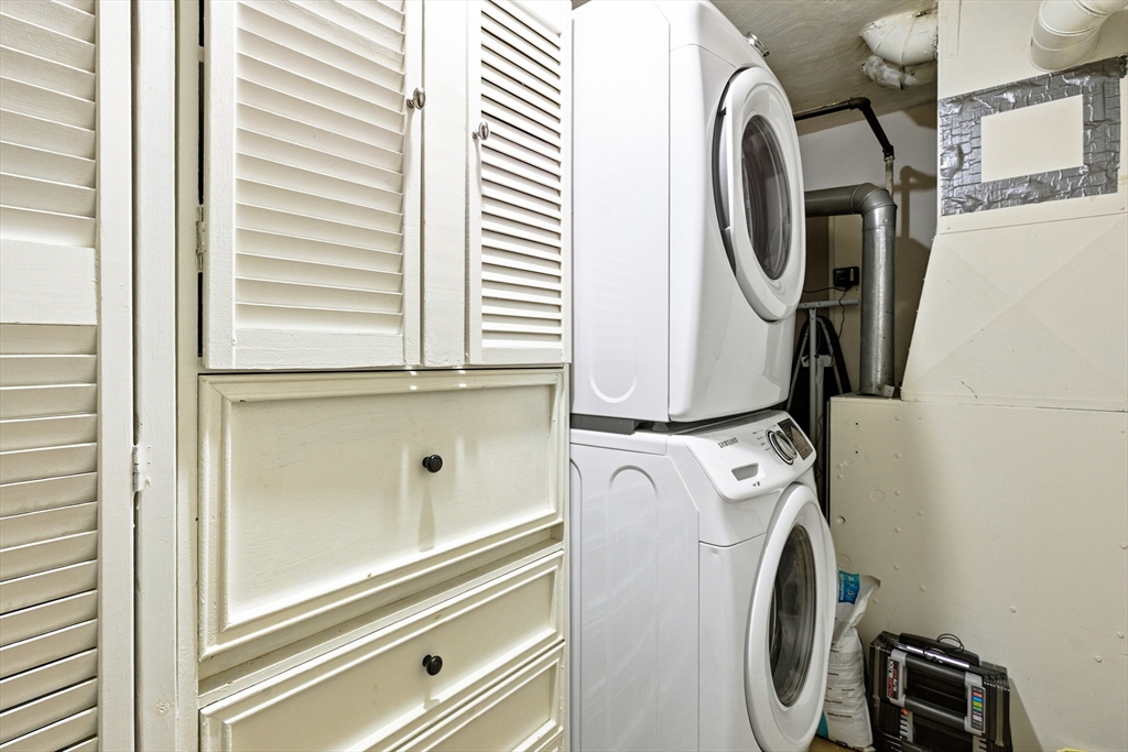 5 Lewis Farm Road, Unit 5 Dedham, MA 02026 - Photo 16 of 18 a utility room with dryer and washer