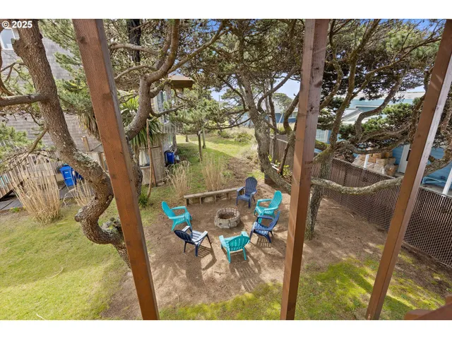 a view of a park with swings and slides