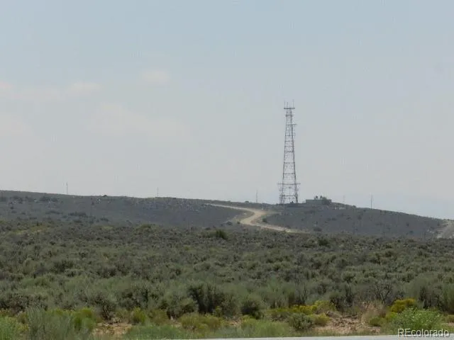 a view of a mountain with sunset view