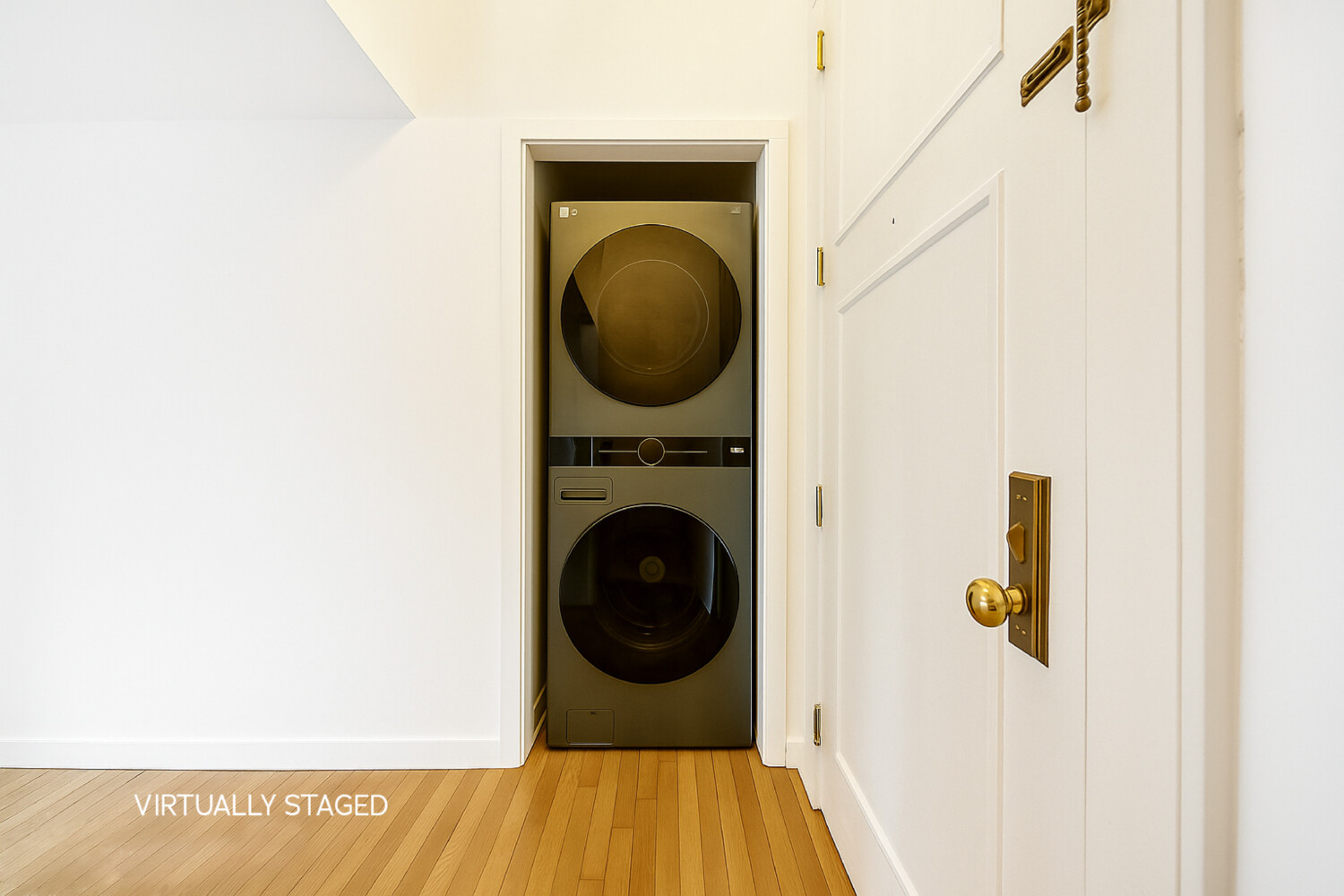 240 Centre Street, Unit 3B Manhattan, NY 10013 - Photo 14 of 20 a view of a hallway with washer and dryer