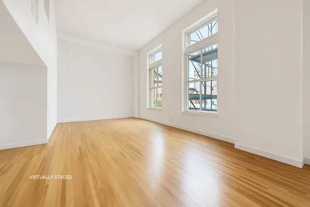 a view of an empty room and window