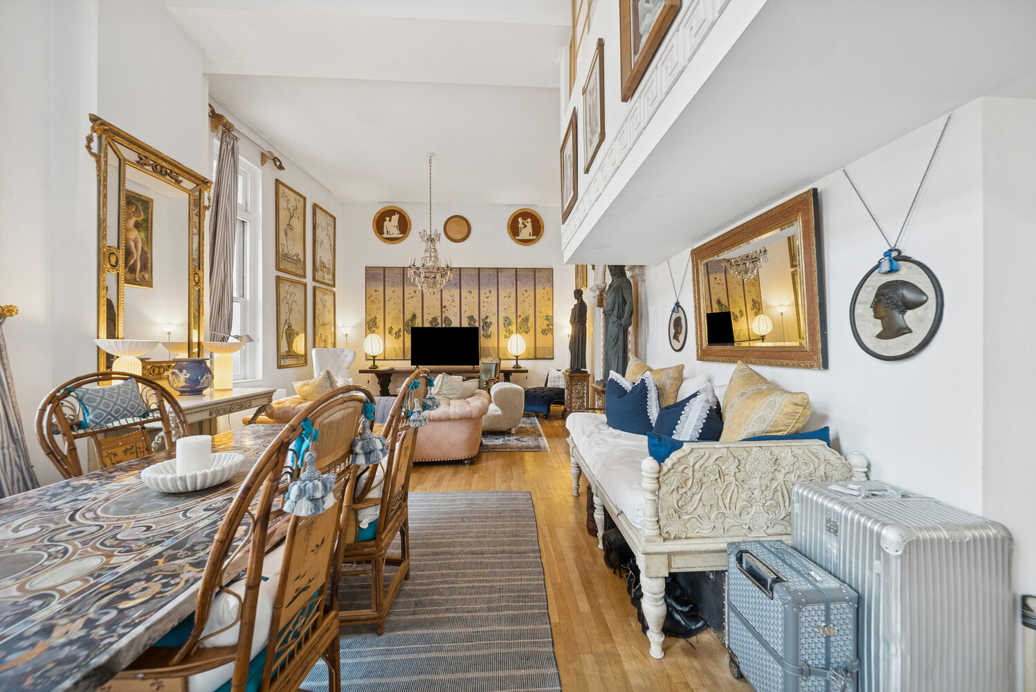 240 Centre Street, Unit 3B Manhattan, NY 10013 - Photo 3 of 20 a living room with furniture and a large window