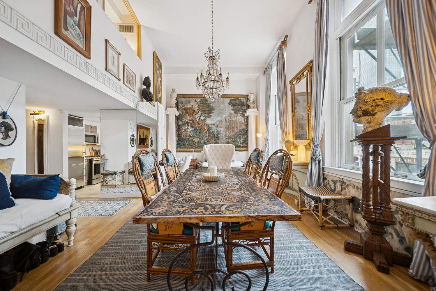 240 Centre Street, Unit 3B Manhattan, NY 10013 - Photo 5 of 20 a view of a dining room with furniture one side kitchen view and wooden floor