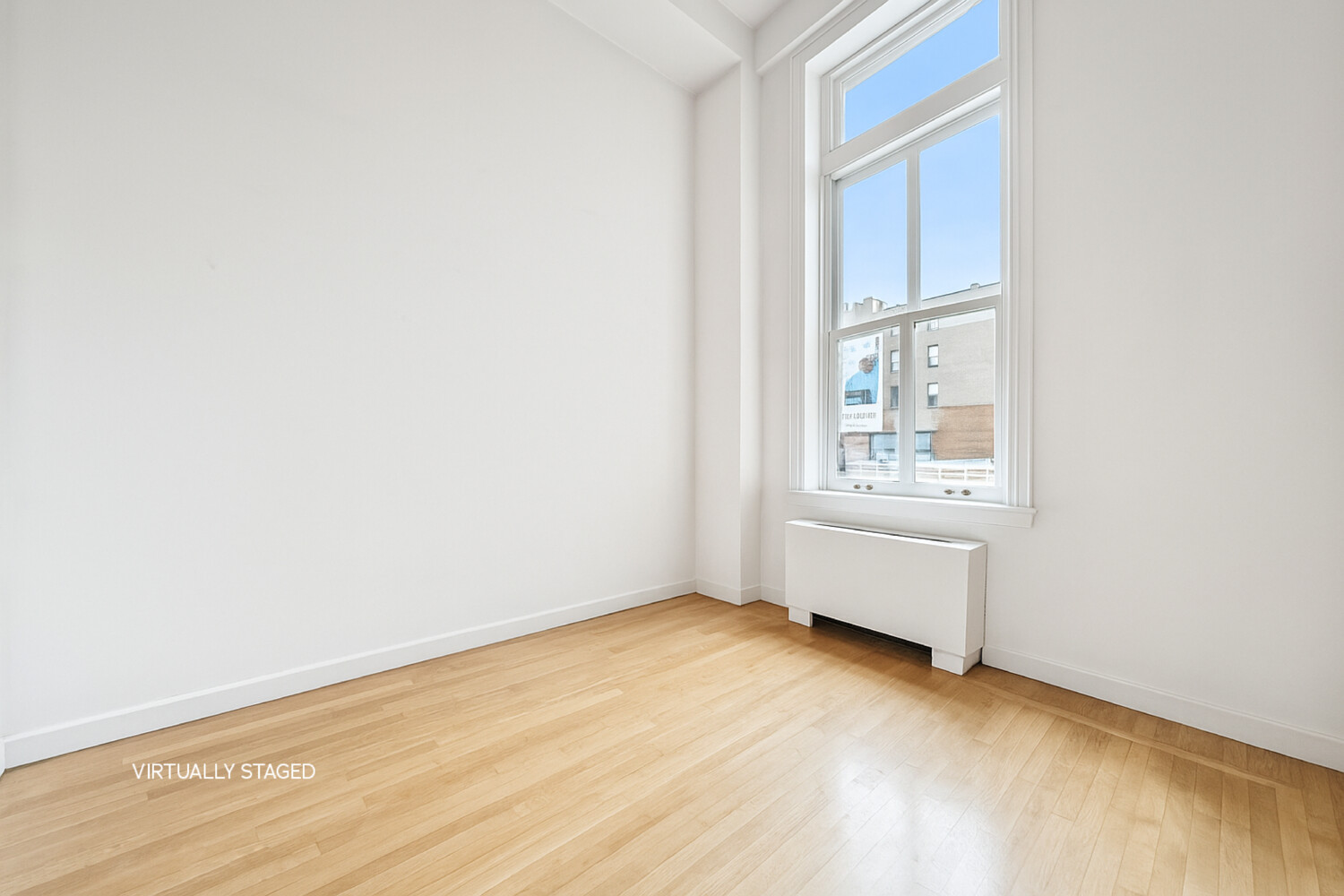 240 Centre Street, Unit 3B Manhattan, NY 10013 - Photo 8 of 20 an empty room with windows