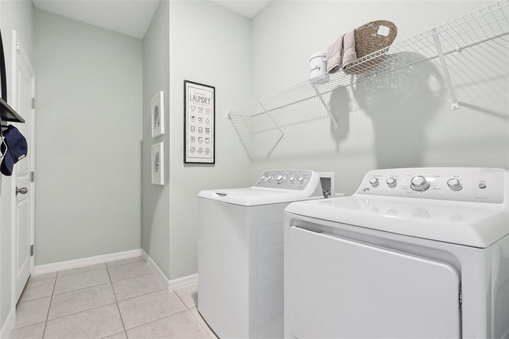 3851 Rising Trail Davenport, FL 33837 - Photo 35 of 39 a utility room with dryer and washer