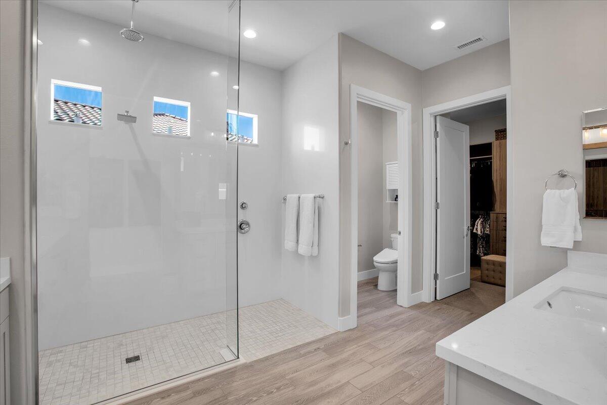 74 Barolo Rancho Mirage, CA 92270 - Photo 23 of 56 a bathroom with a shower and sink