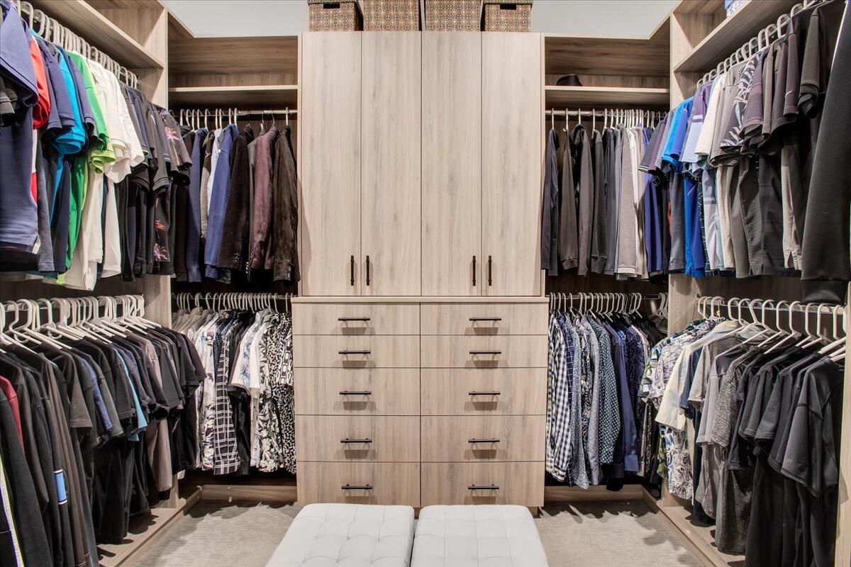 74 Barolo Rancho Mirage, CA 92270 - Photo 24 of 56 a view of walk in closet with clothes