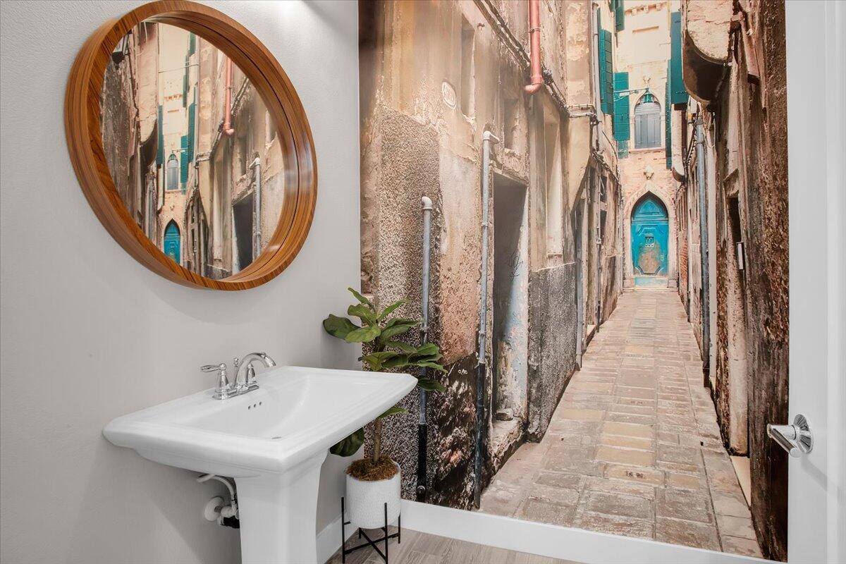 74 Barolo Rancho Mirage, CA 92270 - Photo 25 of 56 a bathroom with a sink and a mirror