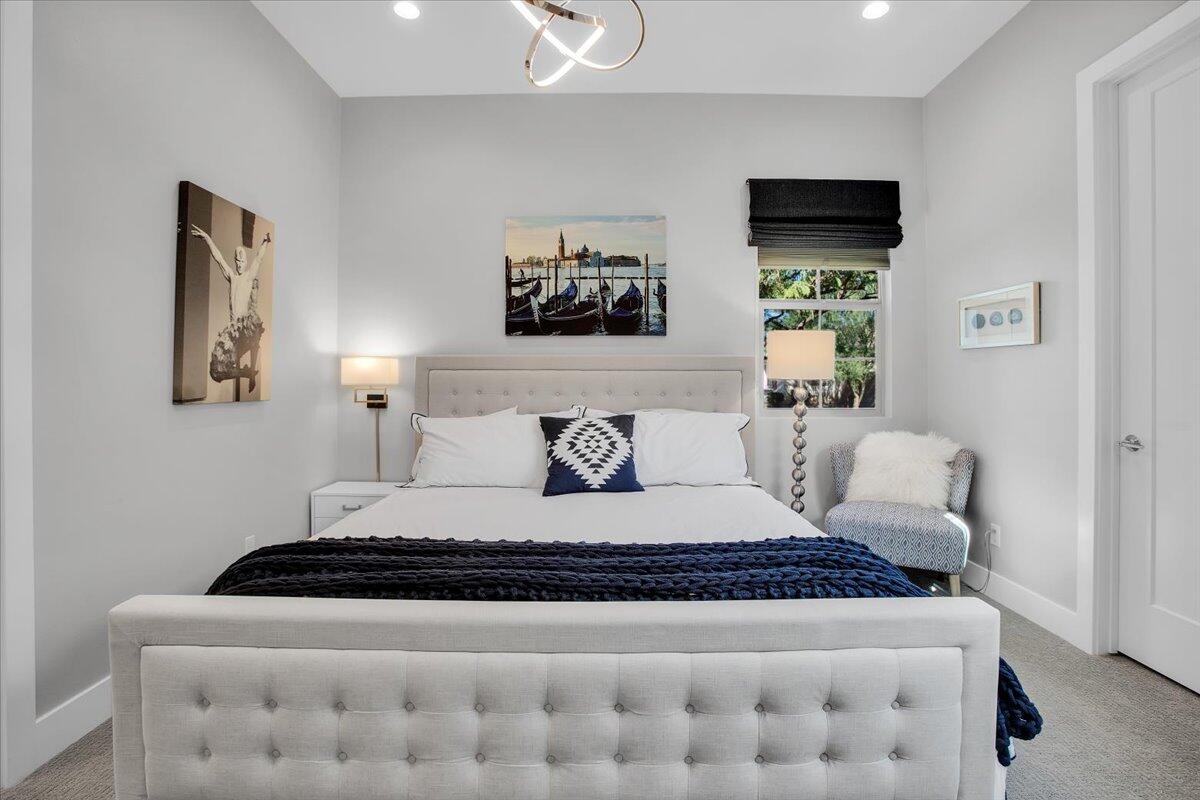 74 Barolo Rancho Mirage, CA 92270 - Photo 27 of 56 a bedroom with a bed and a flat screen tv