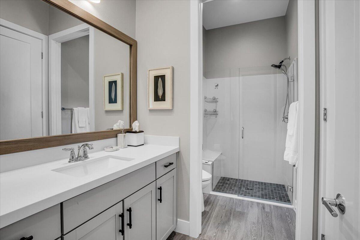 74 Barolo Rancho Mirage, CA 92270 - Photo 29 of 56 a bathroom with a sink and a mirror