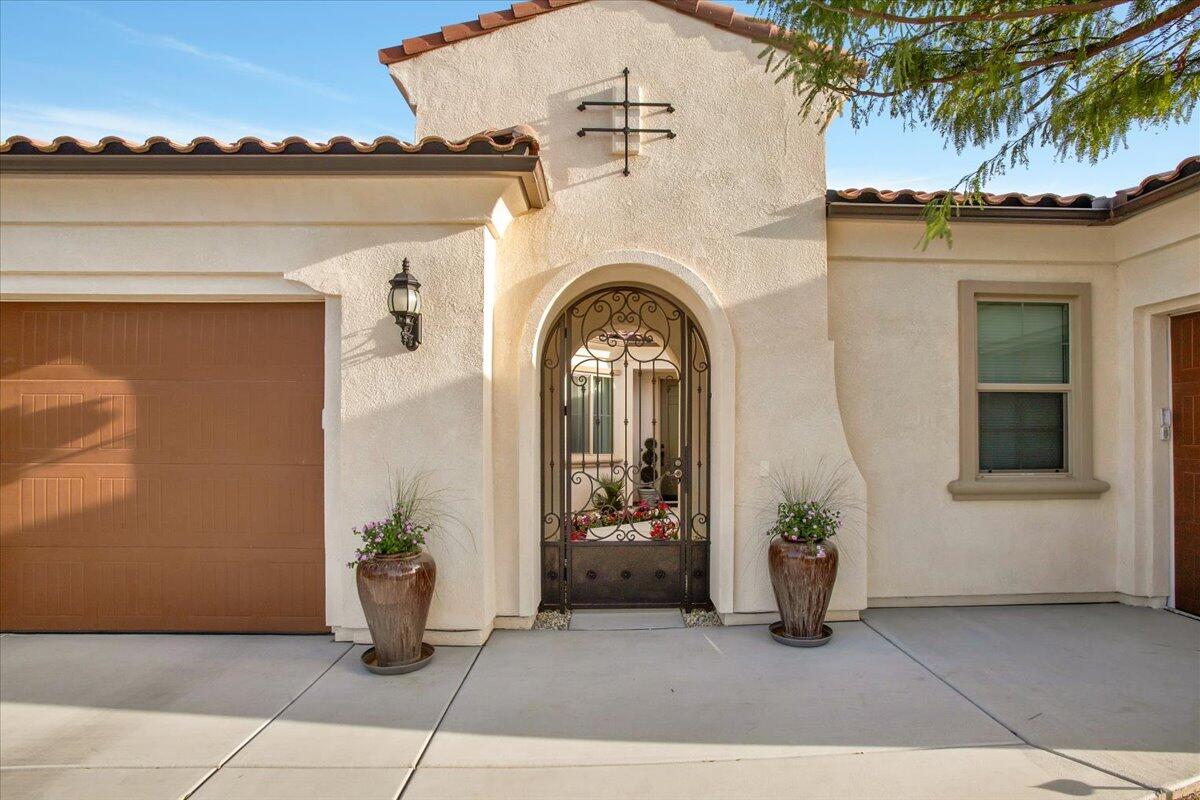 74 Barolo Rancho Mirage, CA 92270 - Photo 3 of 56 a view of a house with potted plants