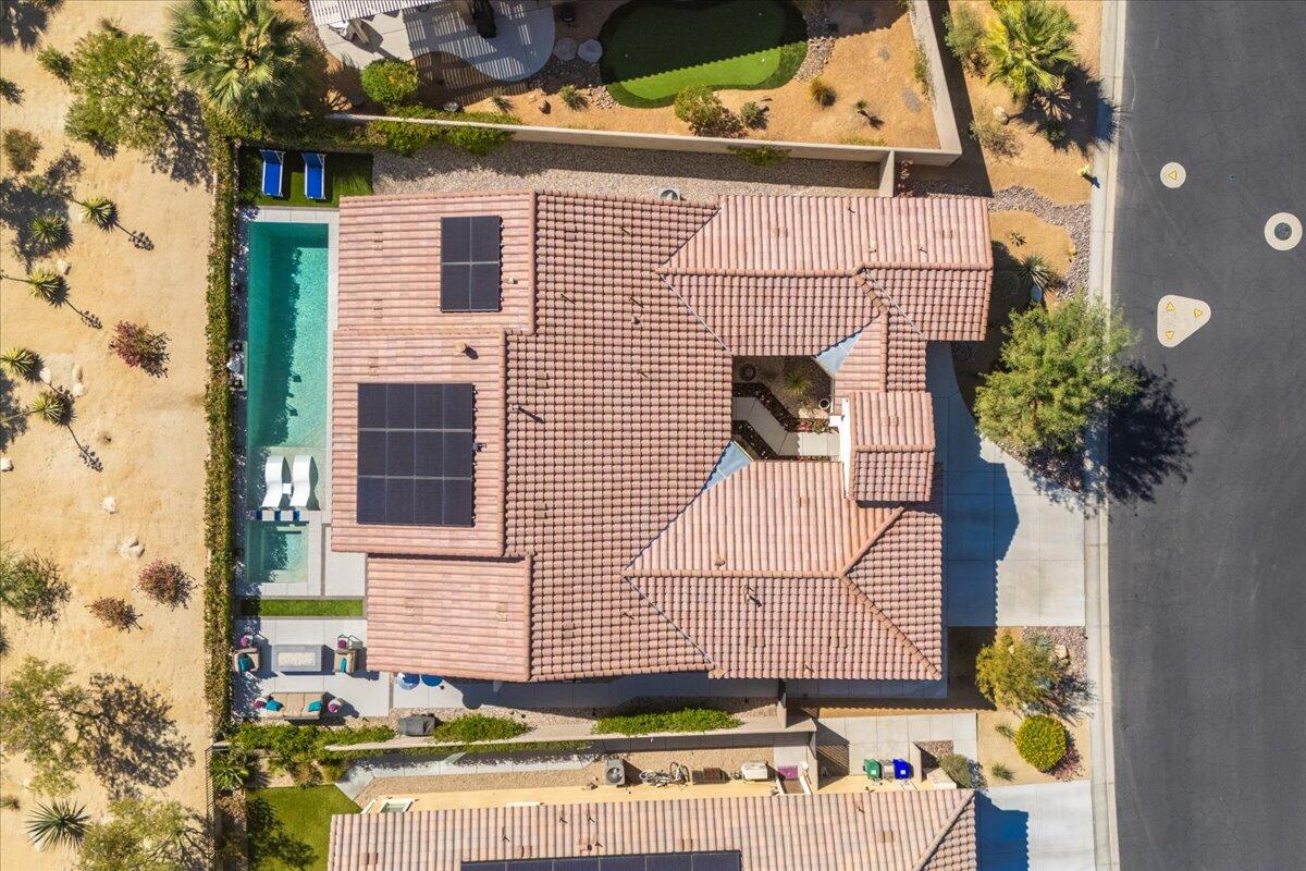 74 Barolo Rancho Mirage, CA 92270 - Photo 37 of 56 front view of a house with a small yard