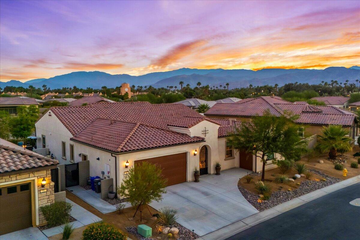74 Barolo Rancho Mirage, CA 92270 - Photo 38 of 56 an aerial view of a house with swimming pool and a yard