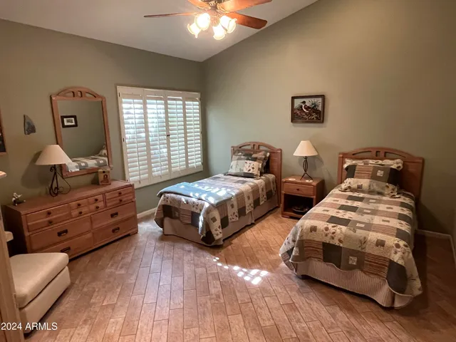 a view of a livingroom with furniture and windows