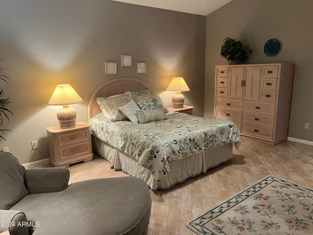 a bathroom with a sink vanity tub and a mirror