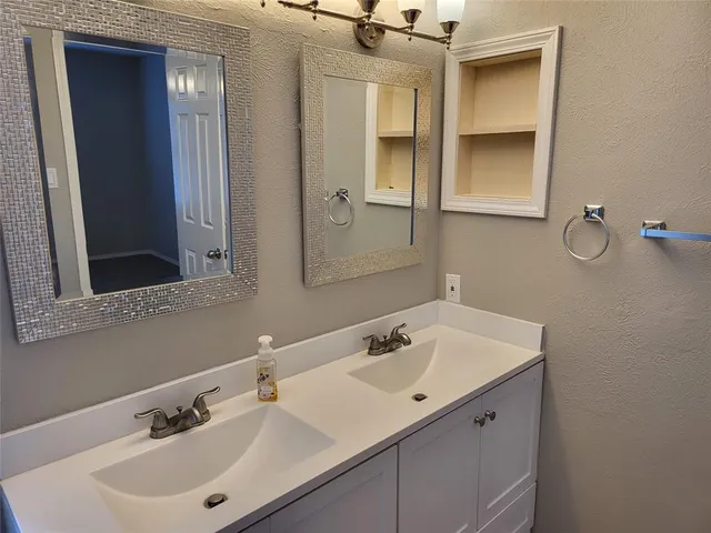 a bathroom with a sink and a toilet