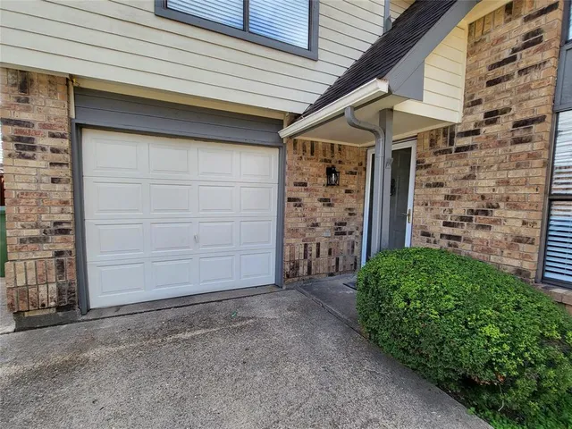 a view of outdoor space and front door