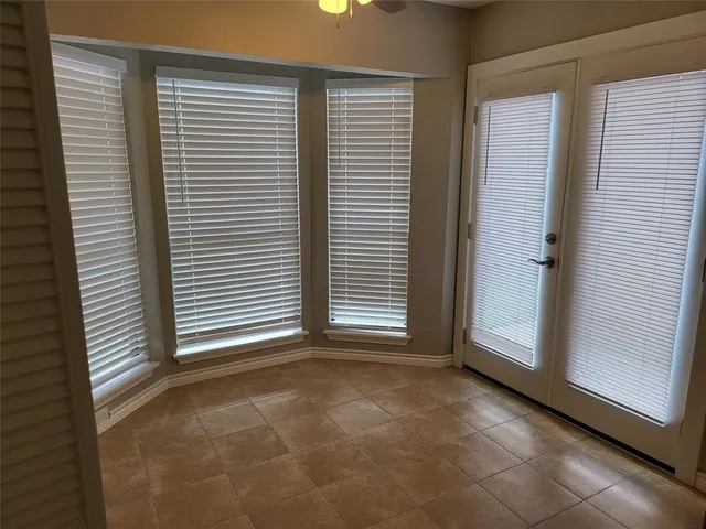 a view of a refrigerator in kitchen