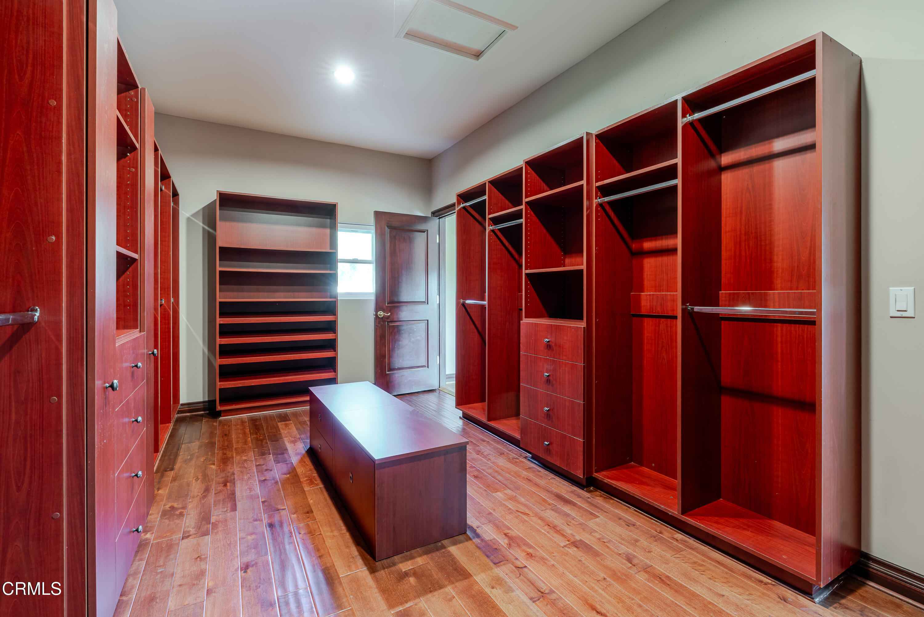 825 Chehalem Road La Canada Flintridge, CA 91011 - Photo 16 of 34 a view of walk in closet with clothes and shoes