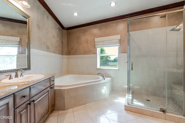 a bathroom with a bathtub and a sink