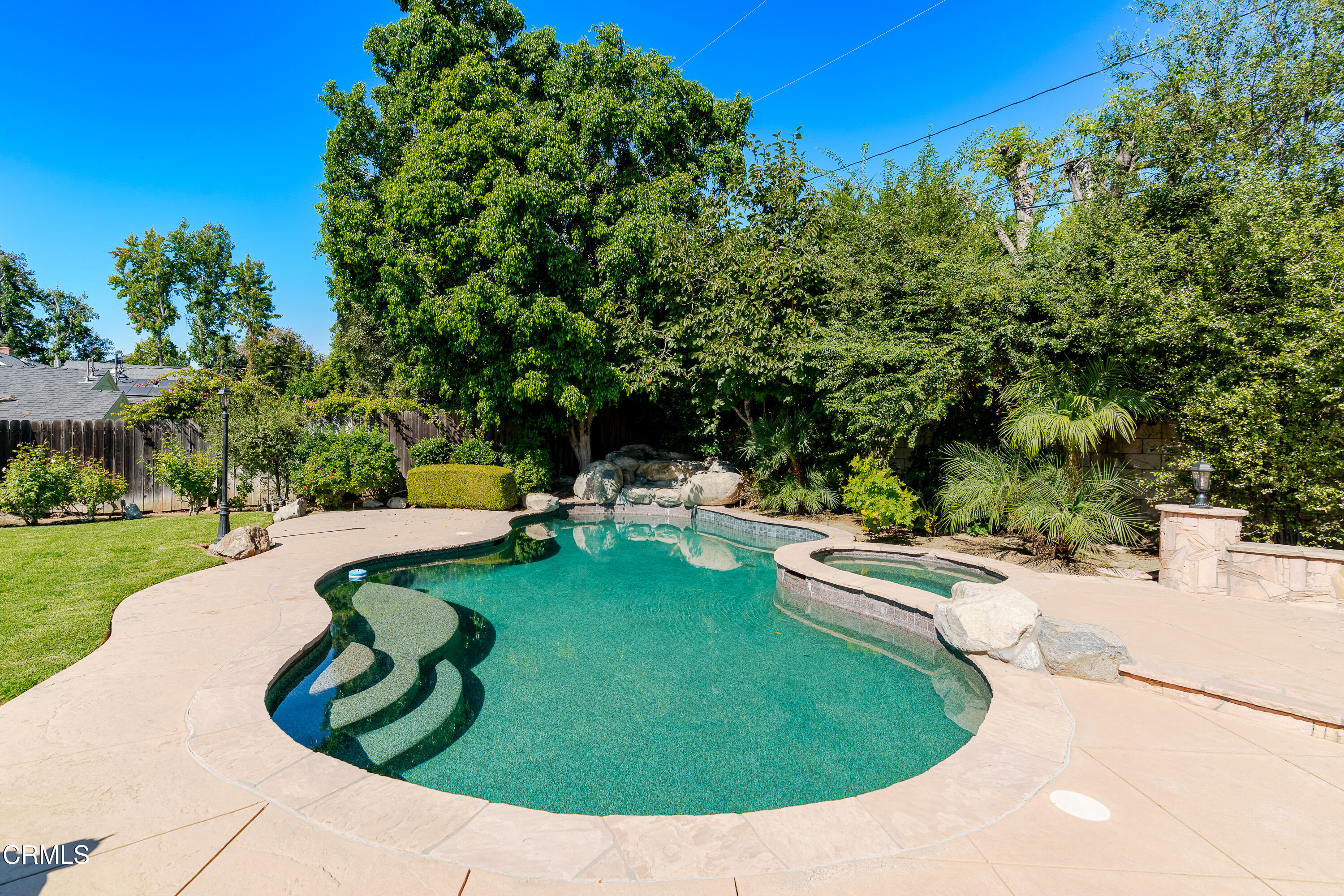 825 Chehalem Road La Canada Flintridge, CA 91011 - Photo 31 of 34 a view of a swimming pool with a patio and a garden