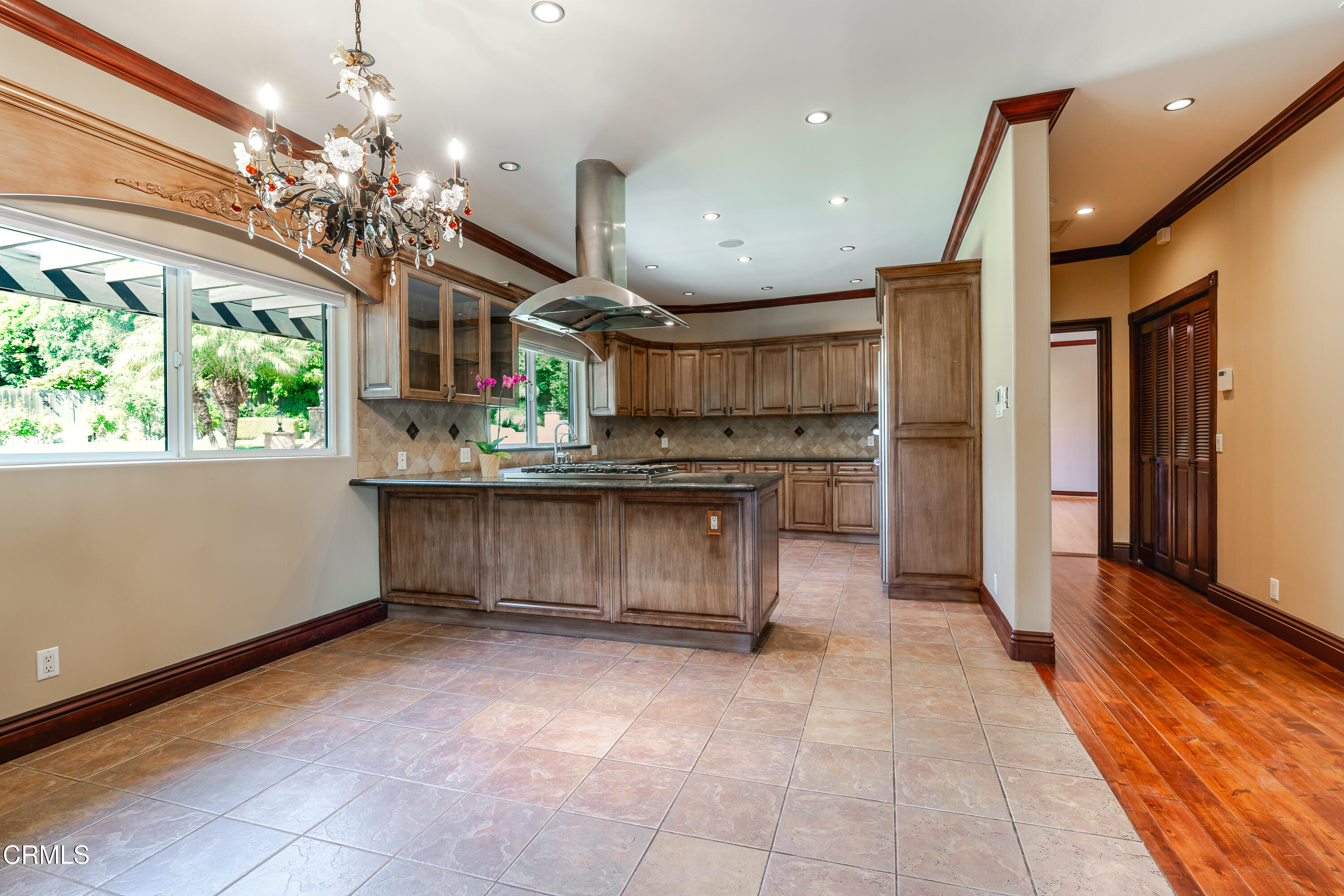 825 Chehalem Road La Canada Flintridge, CA 91011 - Photo 6 of 34 a kitchen with stainless steel appliances granite countertop a refrigerator and a sink