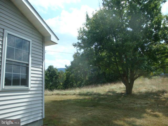2000 Fort Valley Road Fort Valley, VA 22652 - Photo 14 of 25 a view of a house with a yard