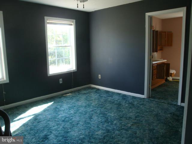 2000 Fort Valley Road Fort Valley, VA 22652 - Photo 17 of 25 a view of an empty room and window