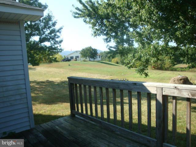 2000 Fort Valley Road Fort Valley, VA 22652 - Photo 20 of 25 a balcony with wooden floor and outdoor space