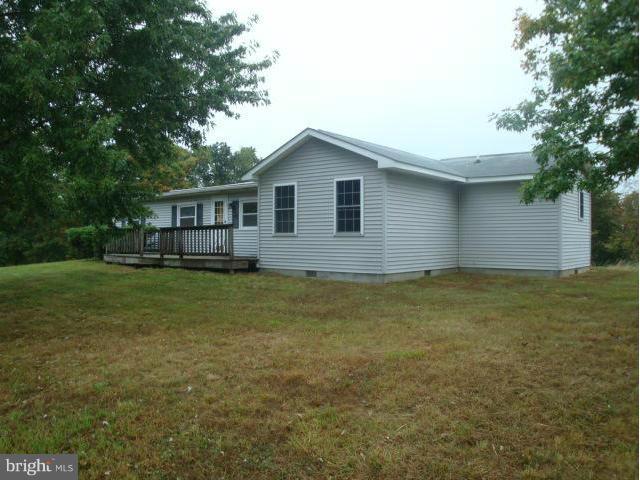 2000 Fort Valley Road Fort Valley, VA 22652 - Photo 2 of 25 a front view of house with yard and trees