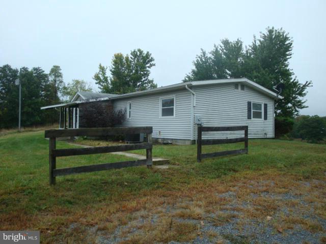 2000 Fort Valley Road Fort Valley, VA 22652 - Photo 6 of 25 a view of a house with a yard