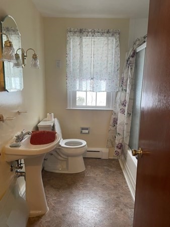 70 Woodcrest Road Springfield, MA 01129 - Photo 19 of 22 a bathroom with a sink toilet and shower