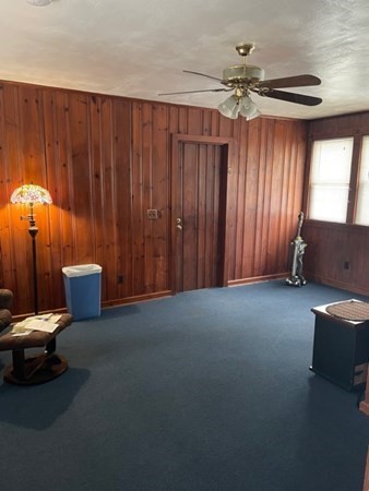 70 Woodcrest Road Springfield, MA 01129 - Photo 4 of 22 a view of a livingroom with furniture and a ceiling fan