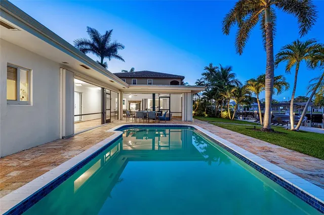 a view of a house with swimming pool